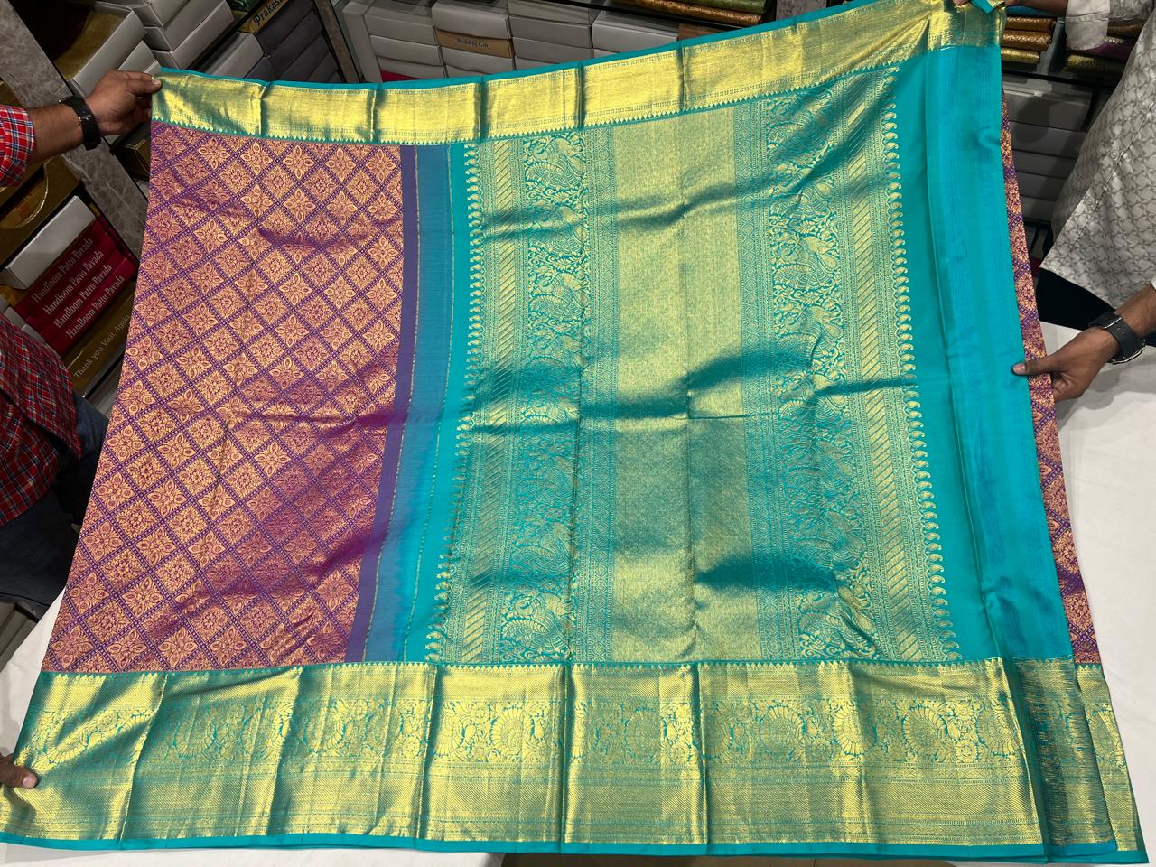 Magenta Kanchipuram Silk Saree with Turquoise Blue Zari Border & Rich Pallu