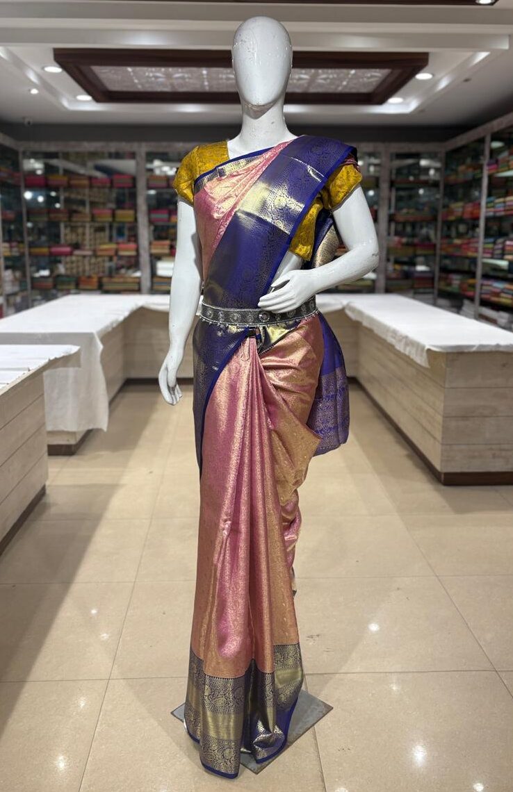 Elegant Dual-Tone Gold and Peach Kanchipuram Silk Saree with Royal Blue Zari Border