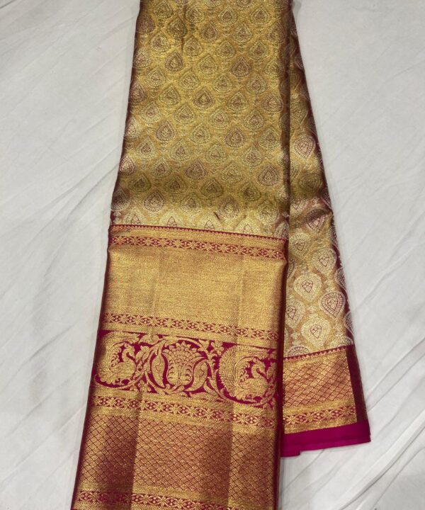 Royal Gold and Pink Kanchipuram Silk Saree with Intricate Peacock Zari Border