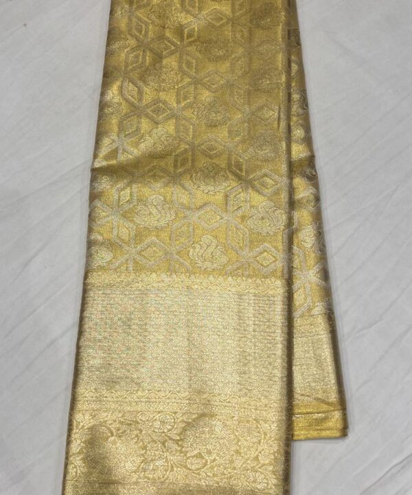 Majestic Golden Kanchipuram Silk Saree with Intricate Zari Weaving and Elegant Floral Motifs