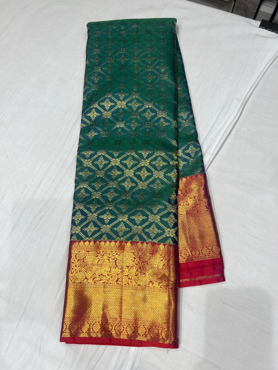 Traditional Bottle Green Kanjivaram Silk Saree with Rich Red & Gold Zari Border